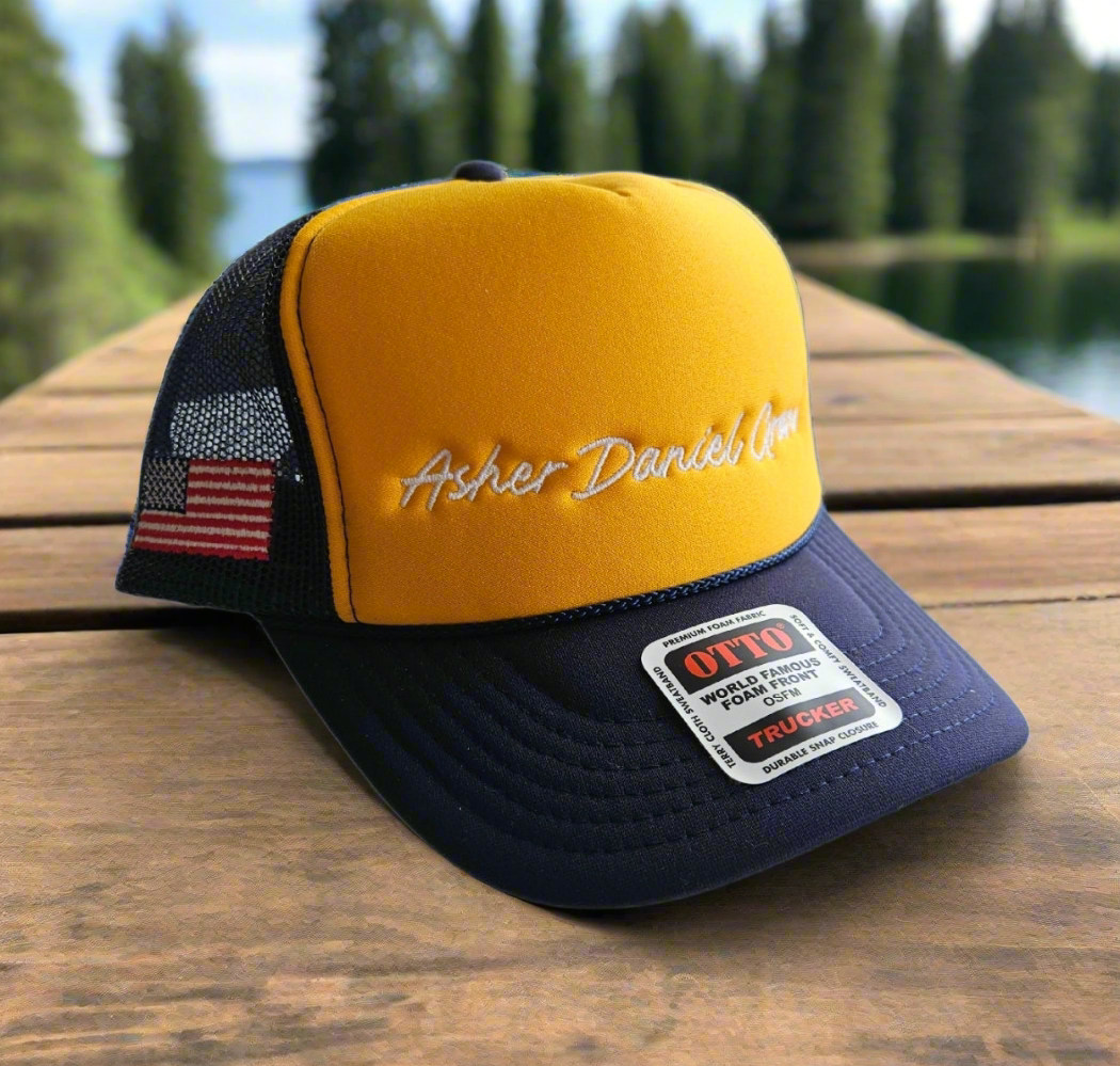 Asher Daniel Grand - 'Simply Grand' - Embroidered Premium Snapback Foam Trucker Cap (Navy/Gold/White Stitch)